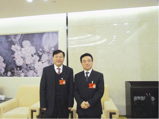 湖南省人大常委會副主任陳叔紅與董事長王五星合影